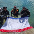 Крымские спасатели развернули флаг республики в глубинах Голубого озера Кабардино-Балкарии